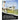 Children practice soccer passing and ball control with a dualsided rebounder on a field