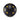 A black balance ball with yellow cutouts rests on a plain white surface