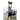 Man lifts a weighted bag during training on an outdoor sports field with onlookers