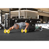 Man using the SKLZ COREwheels while doing push ups to help develop his core strength