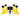 The digital timer displays time while surrounded by four yellow cones with speakers in an indoor setting.
