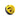 A yellow and black helmet with smiley face vents for safety during outdoor activities