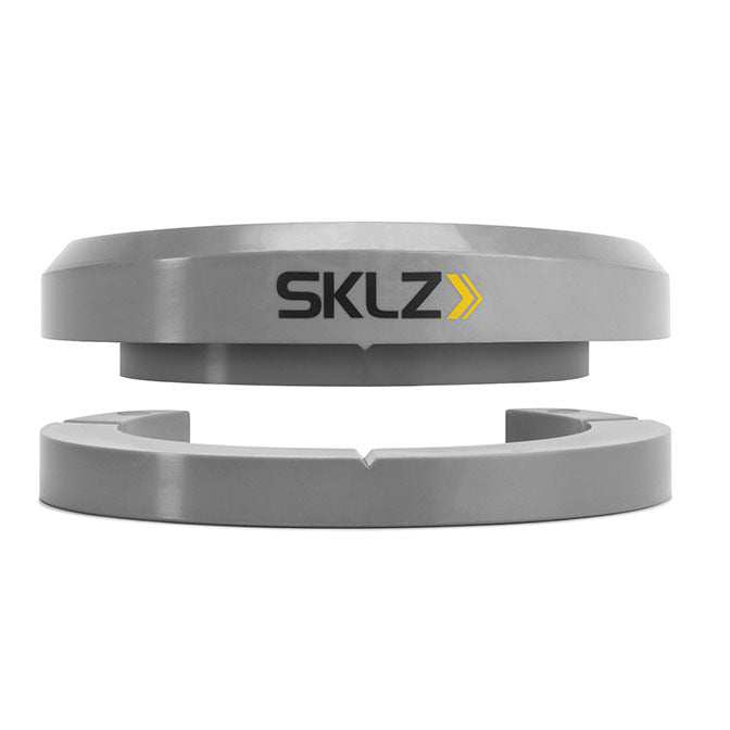 Side view of silver putting pocket trainer with SKLZ logo on front 