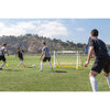 Team playing with SKLZ pro training soccer goal