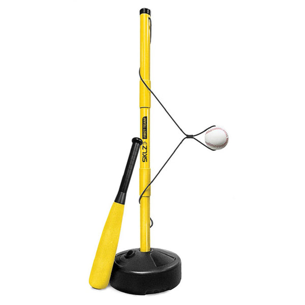 Yellow baseball hitting trainer with Black base and small bat leaning against it.