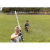 Two young boys playing baseball with SKLZ Quick Stick