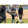 Young boys returning from the playground with one young boy carrying SKLZ Quickster net in SKLZ's long black bag