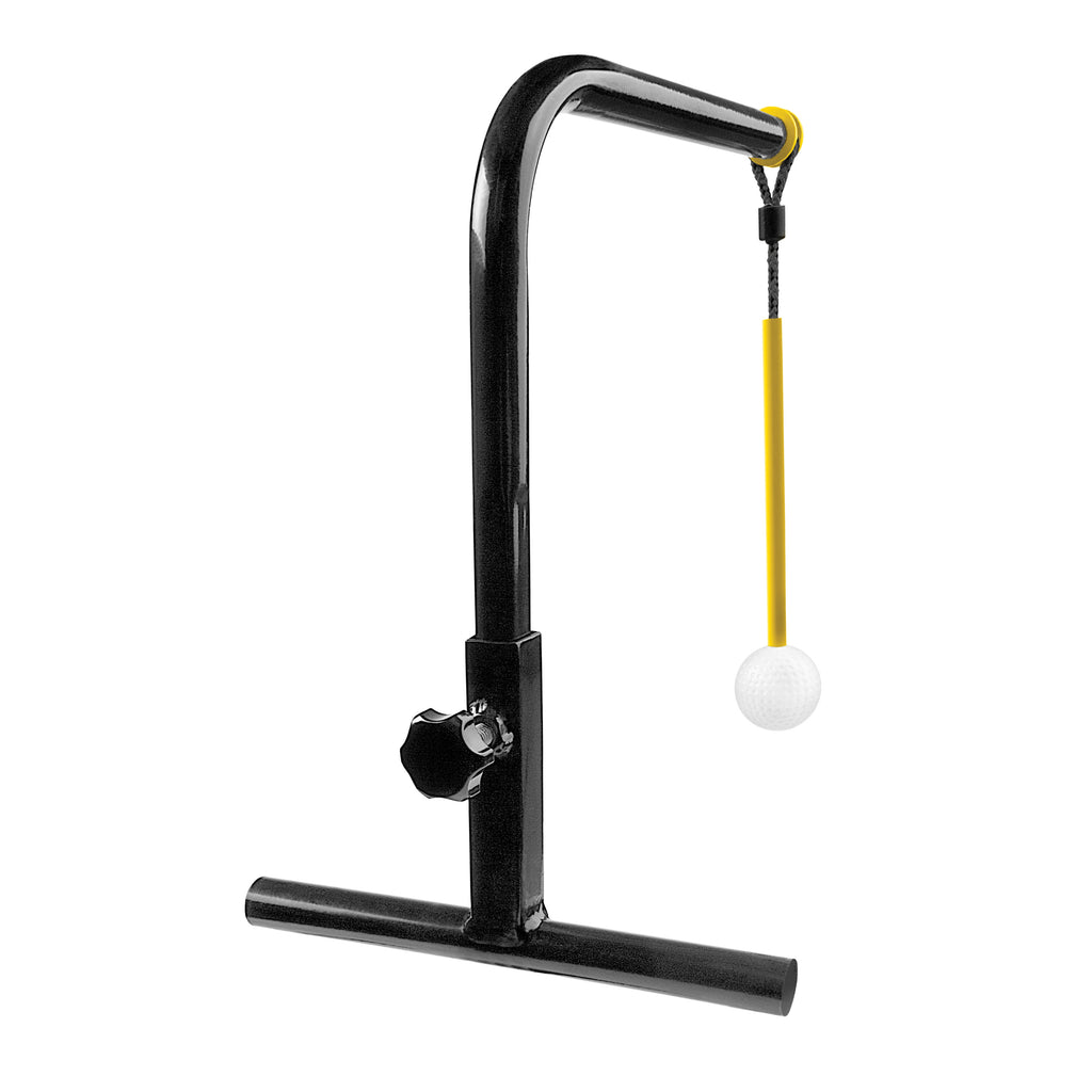 Golf swing trainer on small turf base with yellow ball attachment
