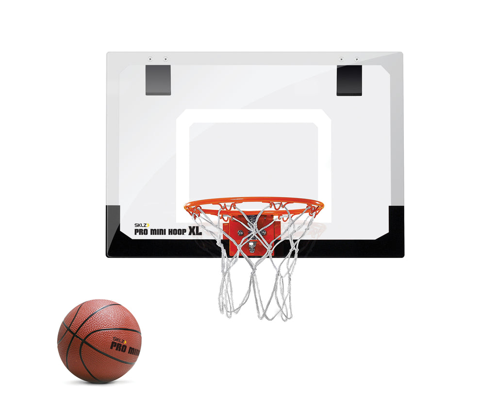 Close view of black and white mini backboard and basketball hoop with small basketball