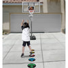 Young boy practicing basketball with SKLZ's shot spotz