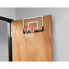 white mini backboard and basketball hoop fixed on a door