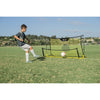 Young boy practicing with SKLZ's soccer trainer