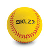 Yellow round SKLZ Foam Training Ball with red stitching sitting on a white background