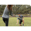 Two people playing baseball with SKLZ Quick Stick