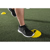 man practicing with SKLZ's agility cones