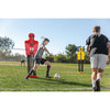 Two young men are playing soccer with SKLZ pro training defenders